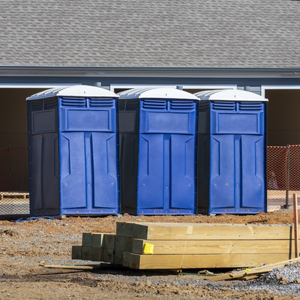 what is the cost difference between standard and deluxe portable restroom rentals in Emerald Bay